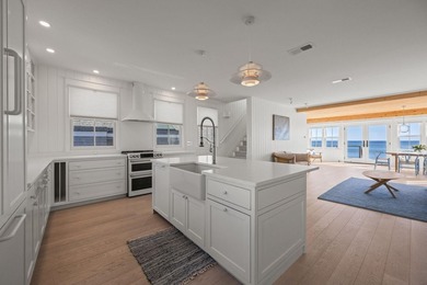 Welcome to 613 Commercial Street, a striking waterfront home in - photo 12