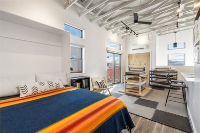 Corner unit with a wraparound balcony and mountain views in