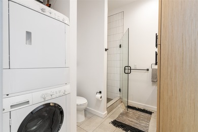 Corner unit with a wraparound balcony and mountain views in