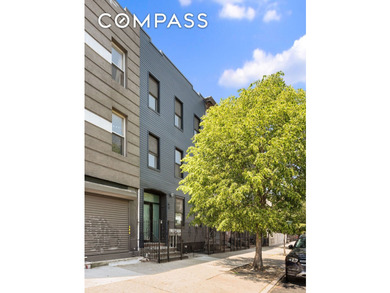 Welcome to 92 Wilson Avenue, a tastefully renovated three-family - photo 1