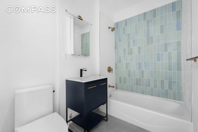Welcome to 92 Wilson Avenue, a tastefully renovated three-family - photo 5