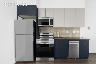 Welcome to 92 Wilson Avenue, a tastefully renovated three-family - photo 7