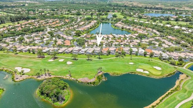 Lake Home For Sale in Palm Beach Gardens, Florida