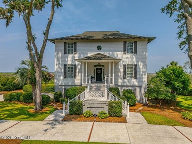 Set along the marsh in the prestigious gated community of - photo 1