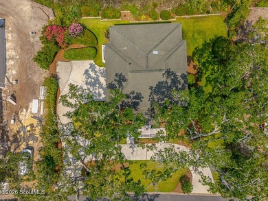 Set along the marsh in the prestigious gated community of - photo 3