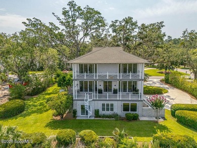 Set along the marsh in the prestigious gated community of - photo 4