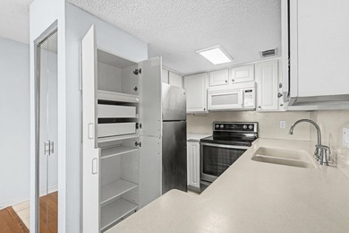 Welcome to Unit 10B at Finisterra in Shalimar--a beautifully - photo 9