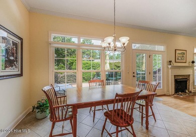 Nestled on a beautifully landscaped 0.83-acre corner lot in the - photo 14