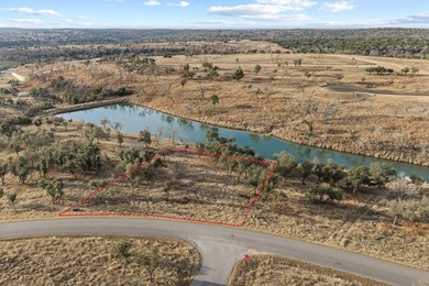This gently sloping homesite on Catfish Lake makes for - photo 1