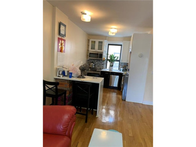 This spacious two bedroom and one full bathroom condo is newly - photo 6