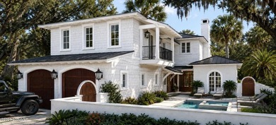New Construction on East Beach. Featuring 4 bedrooms all with en - photo 1