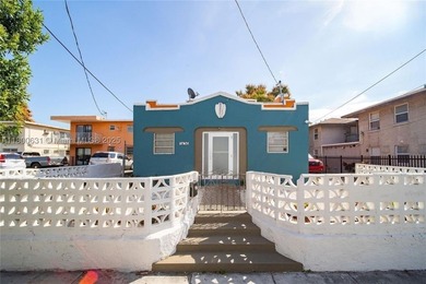 Fully rented income-producing property featuring a 3-bedroom - photo 1