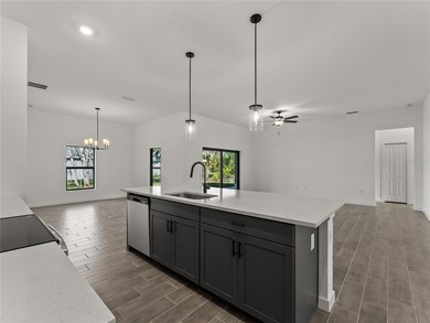 Virtually Staged. Tile throughout. Quartz countertops. Impact - photo 11