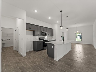 Virtually Staged. Tile throughout. Quartz countertops. Impact - photo 13