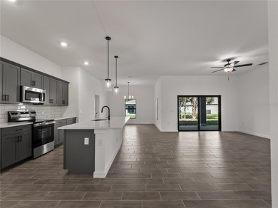 Virtually Staged. Tile throughout. Quartz countertops. Impact - photo 14