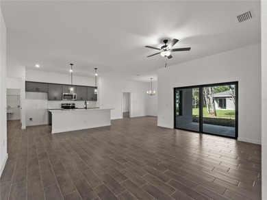 Virtually Staged. Tile throughout. Quartz countertops. Impact - photo 15