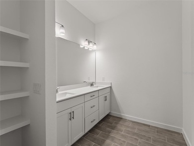 Virtually Staged. Tile throughout. Quartz countertops. Impact - photo 22