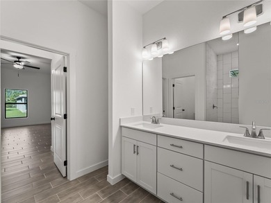 Virtually Staged. Tile throughout. Quartz countertops. Impact - photo 24