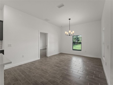 Virtually Staged. Tile throughout. Quartz countertops. Impact - photo 25