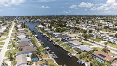 One bridge Gulf access pool home! Boatlift, southern exposure! - photo 30