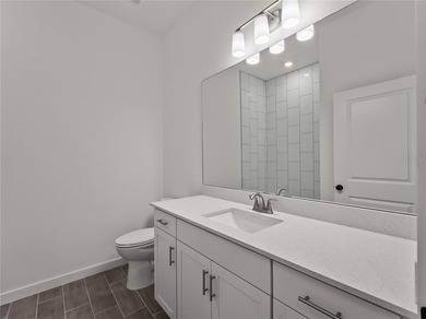 Virtually Staged. Tile throughout. Quartz countertops. Impact - photo 30