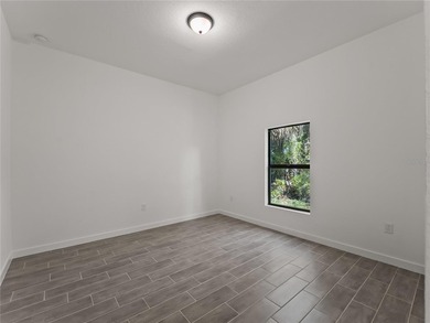 Virtually Staged. Tile throughout. Quartz countertops. Impact - photo 31