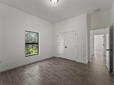 Virtually Staged. Tile throughout. Quartz countertops. Impact - photo 32