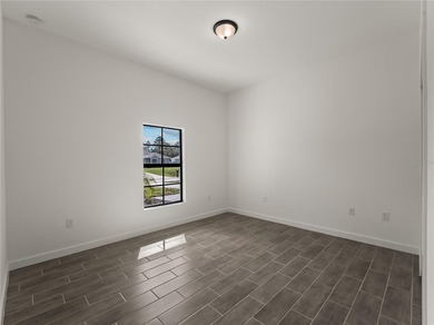 Virtually Staged. Tile throughout. Quartz countertops. Impact - photo 33