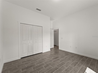Virtually Staged. Tile throughout. Quartz countertops. Impact - photo 34
