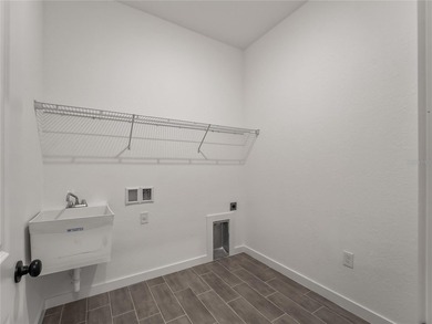 Virtually Staged. Tile throughout. Quartz countertops. Impact - photo 39