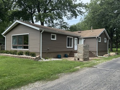 Located in the well-known Phelan Acres river community, this - photo 1