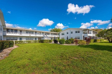 Welcome to this well-maintained second-floor condo in the - photo 18