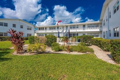 Welcome to this well-maintained second-floor condo in the - photo 20