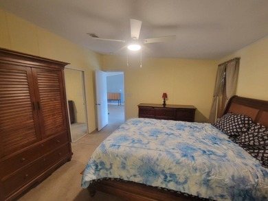 Affordable Luxury in a 55+ Community One of the rare 3-bedroom - photo 22