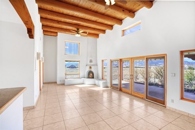 24 Hunter Drive is a pueblo style home in the Vista de Pedernal