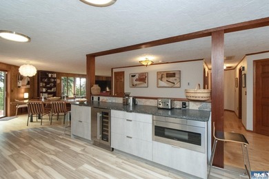 A rare blend of artistic architecture and modern luxury on this - photo 10