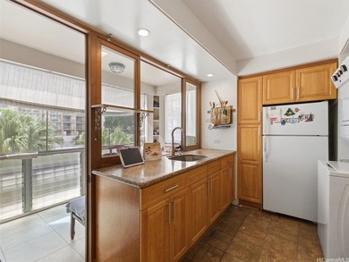 2-bedroom, 2-bath unit in the Palms building, Waikiki. The - photo 6