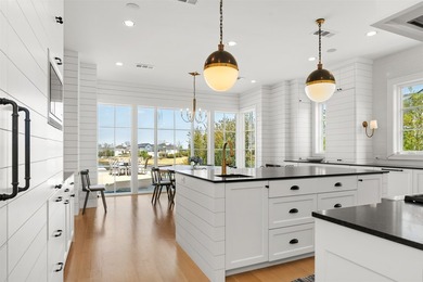 Set within the beautiful gates of Long Cove, this exceptional - photo 3