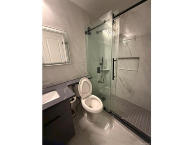 Come take a look at this renovated spacious duplex condo - photo 5