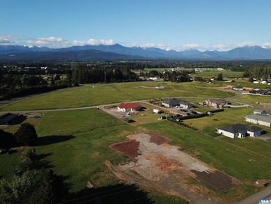 This prime 1 acre building lot with Olympic Mountain views and - photo 3