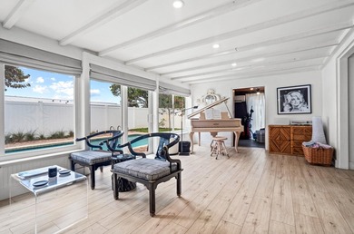 Beautifully updated 4/2 pool home in North Palm Beach. New metal - photo 11