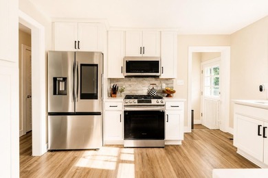 RARE opportunity to own a beautifully updated home just steps - photo 12