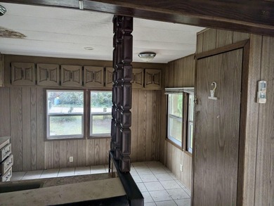 This mobile home sits on a spacious lot near the end of a - photo 14