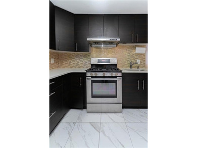 Spacious 1-bedroom condo located in a well-maintained complex in - photo 4