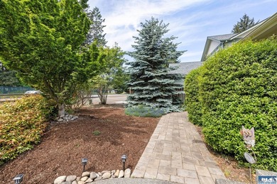 Tucked beyond a paved driveway and framed by crosswood fencing - photo 2