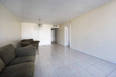 Just steps from the sand, this large 736 sqft 1-bedroom condo at