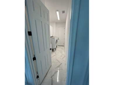 Located in one of the most sought-after communities in the Port - photo 11