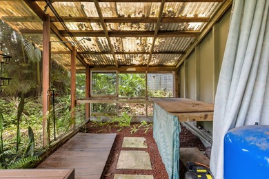 Tucked away in lush greenery in Hawaiian Paradise Park, this - photo 23