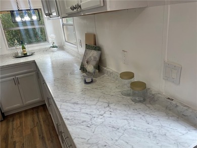 Discover the charm of small-town living in this fully remodeled - photo 3