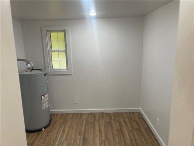 Discover the charm of small-town living in this fully remodeled - photo 5